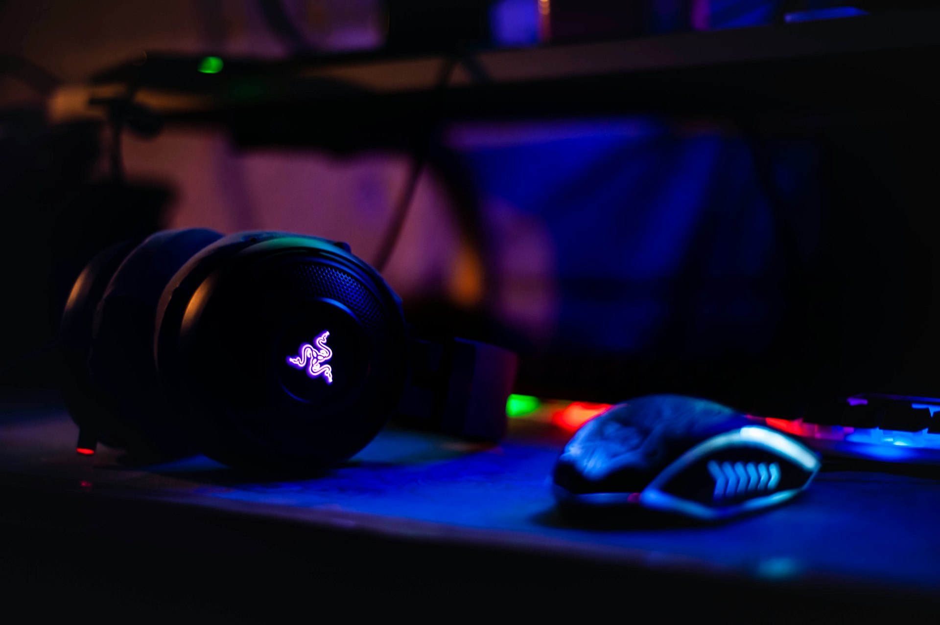 Razer headset near computer mouse